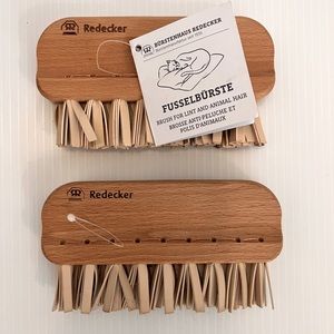 Pair of Redecker lint Brushes